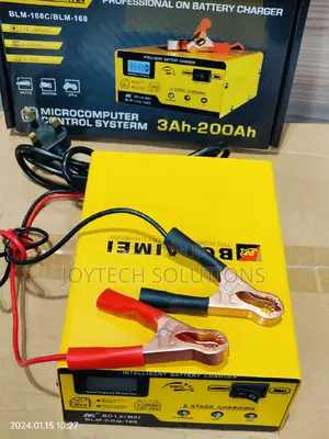 BATTERY CHARGER . Computerized Trickle/ Fast Charging