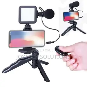 Phone Tripod Table Stand. With Microphone Lighting
