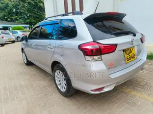Silver 2015 Toyota Corolla Fielder: A Smart Choice for Your Drive