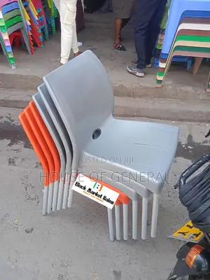 Armless Plastic Chair With Metal Tubing Legs