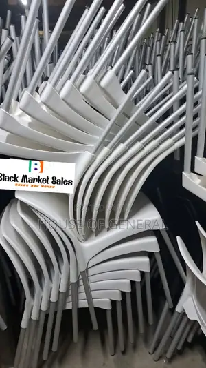 White Armless Plastic Chair With Metal Legs