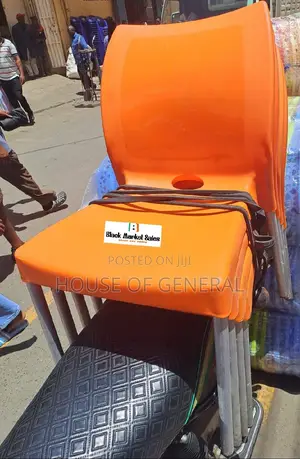 Armless Plastic Chair With Metal Tubing Legs