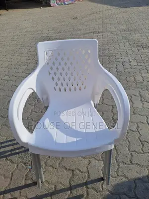 White Plastic Chair With Metal Tubing Legs
