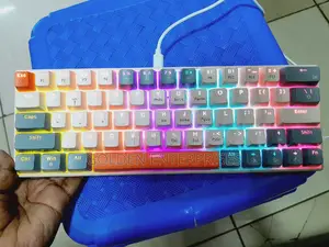 Portable 63 Key Mechanical Keyboard With RGB BACK-LIGHT