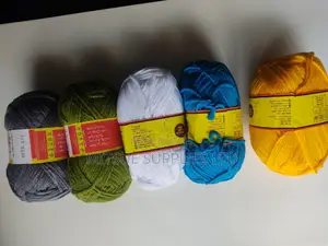 A Packet of 5 Rolls Chunky Bright Colour Yarn With Crochet