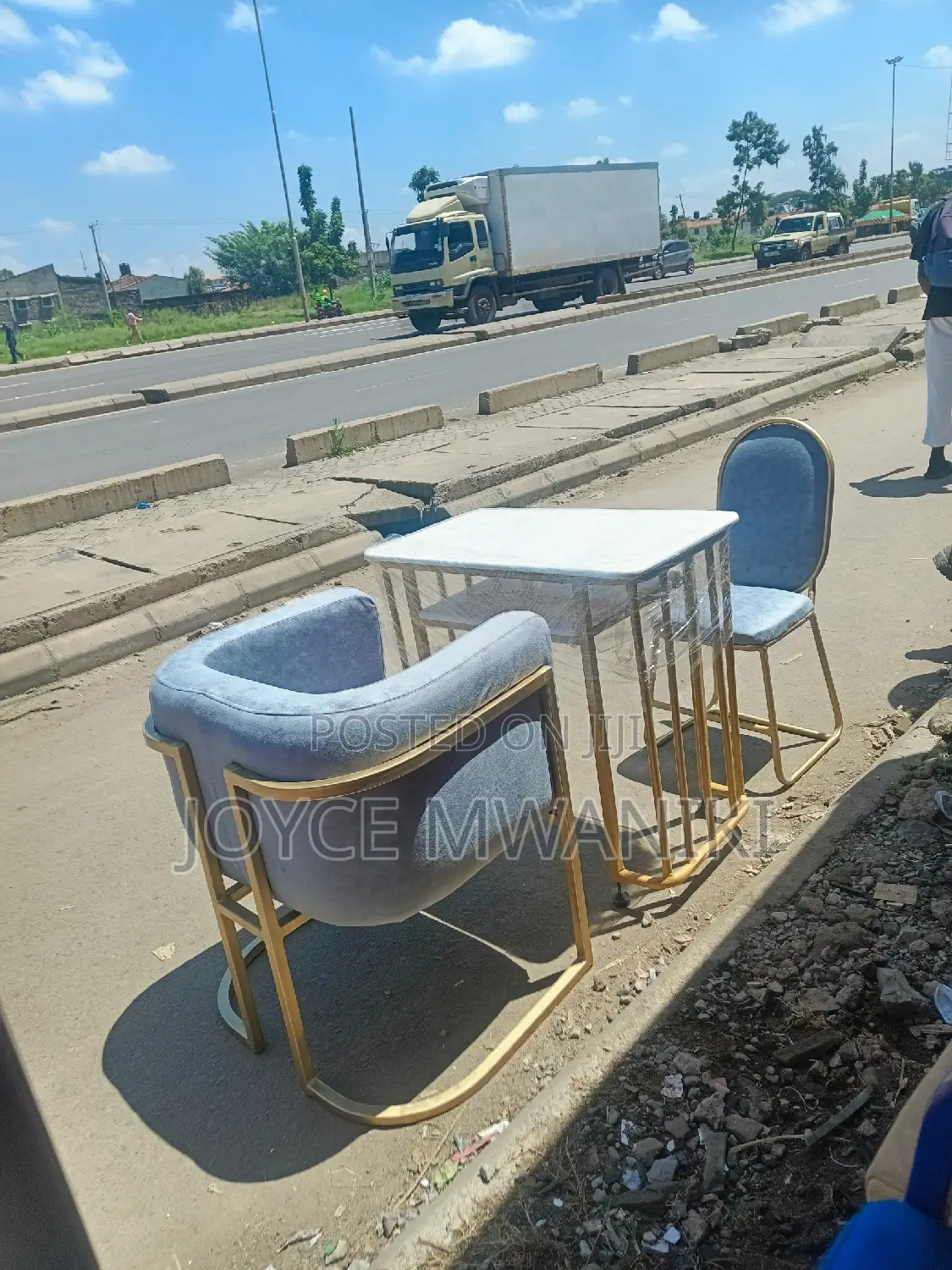 Manicure Set, Grey Seats and a Marble Table 