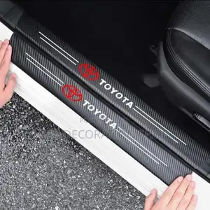 Toyota Car Door Fitted With Branded Carbon Finish Sticker