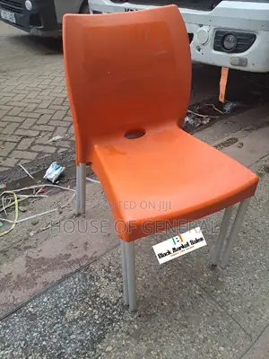 Orange Armless Plastic Chair With Metal Legs