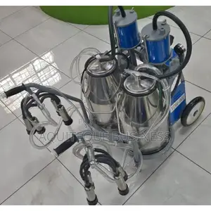 Milking Machine With Double Bucket.