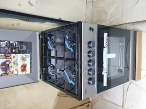 Mika Cooker Electric Oven With Four Burner Standing Cooker.