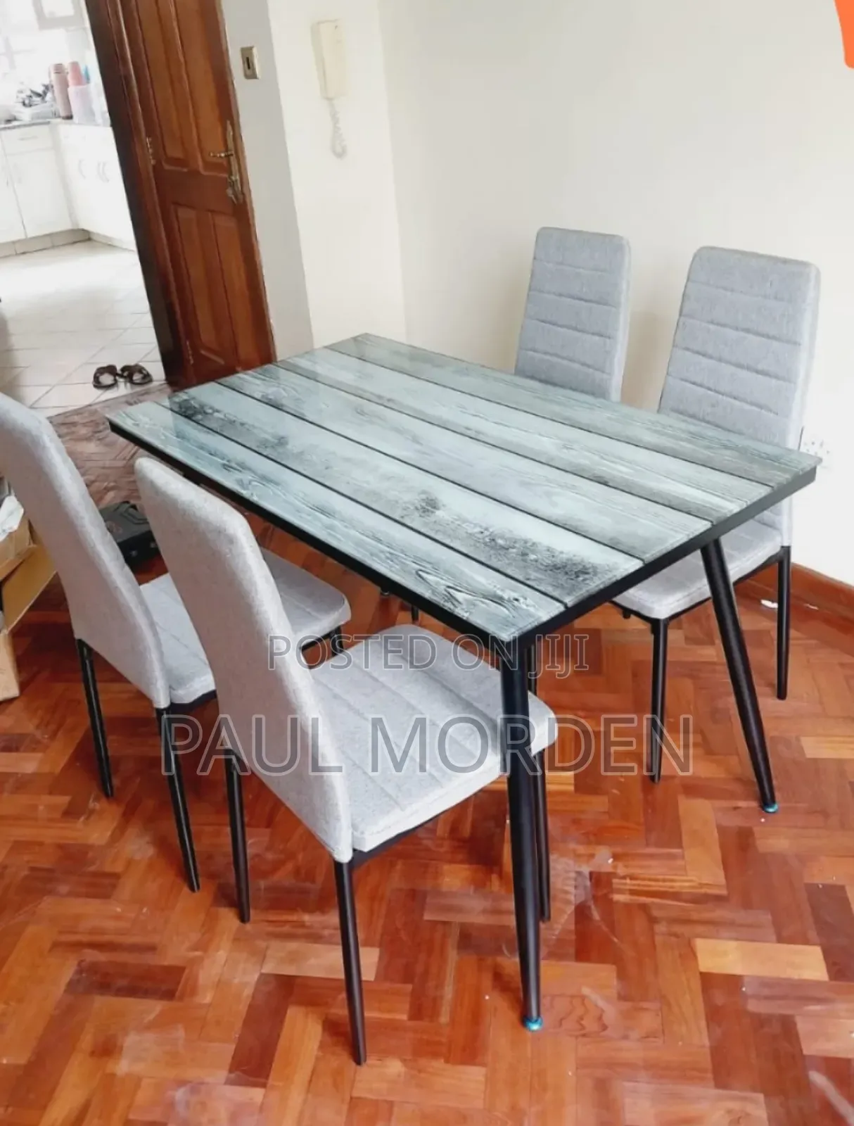 Rectangular Glass Top Dining Table With Four Dining Chairs