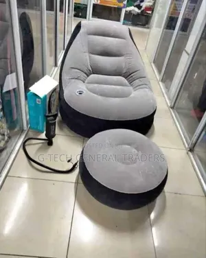 Inflatable Seat With a Manual Pump and Foot Rest