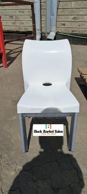 White Plastic Chair With Metal Tubing Legs