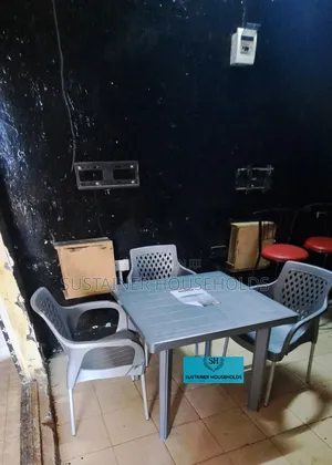 3 Chairs and a Plastic Table Set