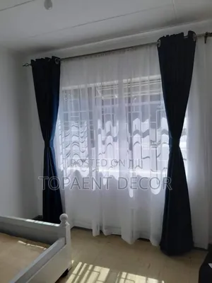 Dark Blue Window Curtain and White Sheers