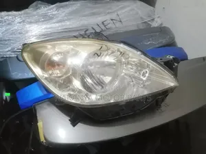 Mazda Demio 2005/2006 Non Xenon Head Lamp, Clean EX Japan
