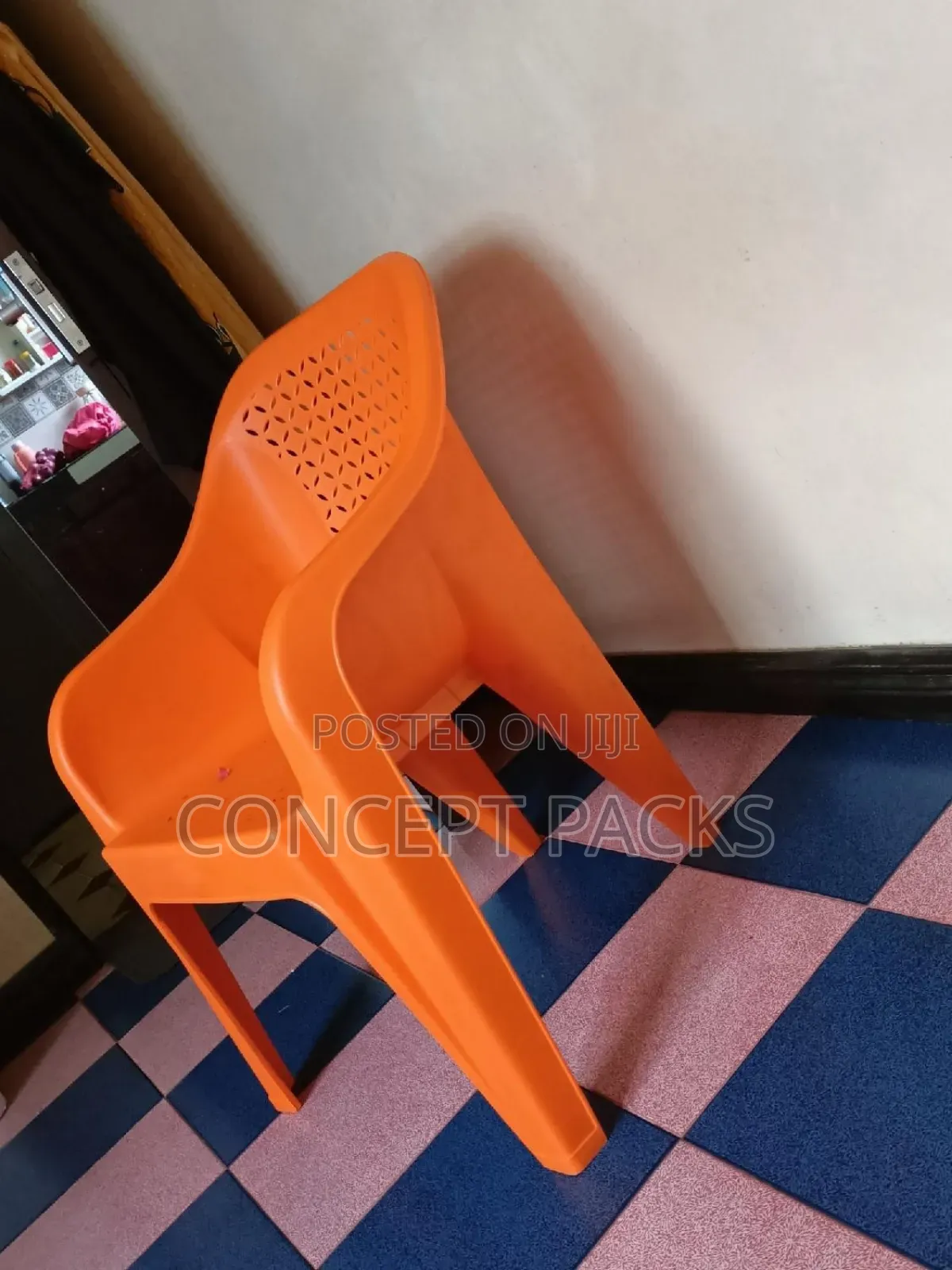 Orange Plastic Easy Chair.