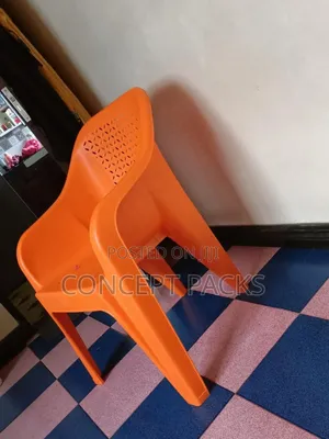 Orange Plastic Easy Chair.