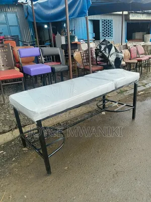 White and Black Massage Bed