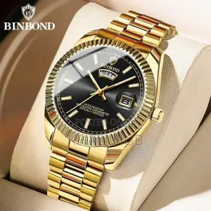 Binbond Day and Date Watch. Gold in Colour With Dark Inside