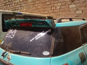 Nissan Wingroad Ad/Mazda Familia Spoiler