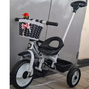 Black Tricycle With Push Handle.