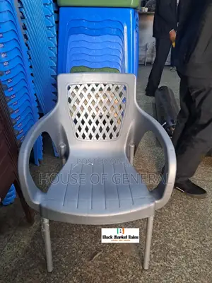 Gray Plastic Chair With Metal Tubing Legs