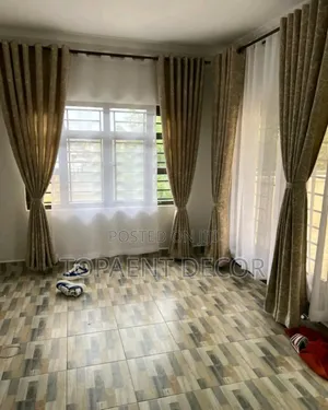 Brown Ring Curtains and White Sheers