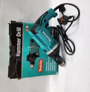 Makita Hammer Drill With Extra Handl