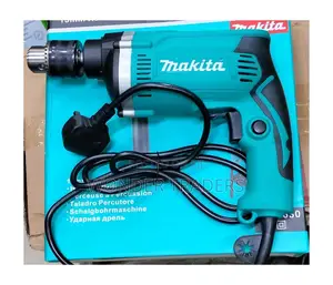 Makita Ph1630
Hammer Drill 
710w
 at 3500