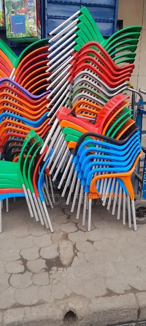 Plastic Chairs With Arms and Metal Tubing Legs