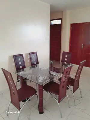 Glass Dining Tables and Leather Chairs