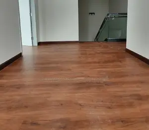 Brown Vinyl Wall to Wall Flooring