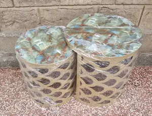 Nesting Stools With Laser-Cut Designs in Gold Colour.