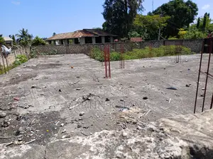 Block Fenced and Gated Plot, With Basic Building Foundation