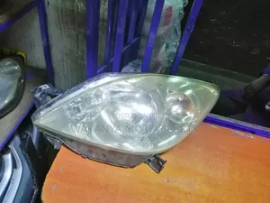 Mazda Demio 2005/2007 Non Xenon Head Lamp, Clean EX Japan