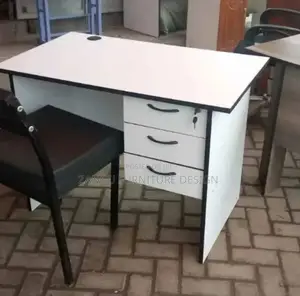 White Office Desk and Black Waiting Chair