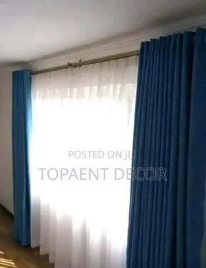 Blue Gunia Curtains and White Sheers
