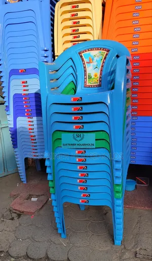 Complast Plastic Chairs With a Flower Backrest