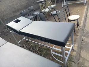 Metallic Examination Bed.