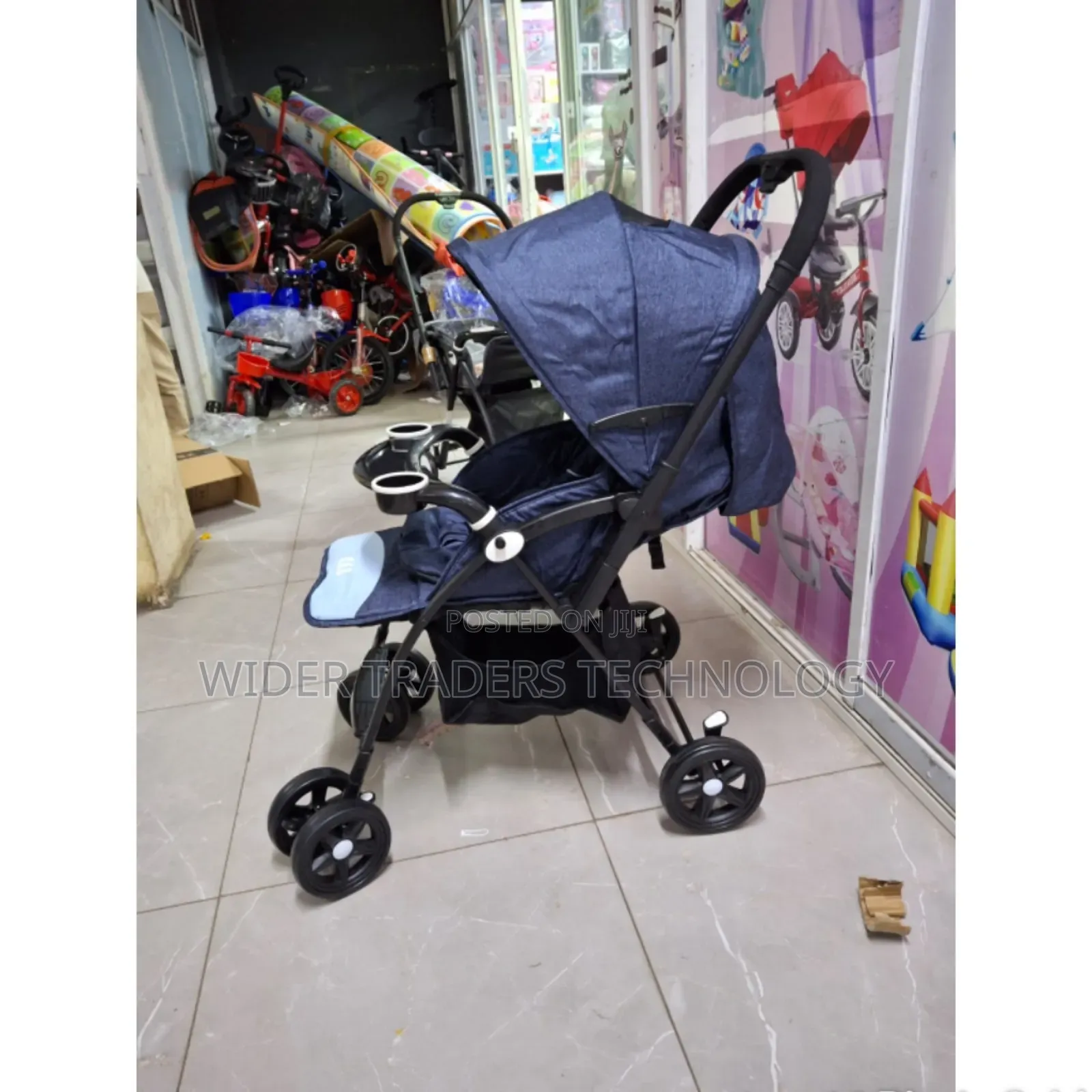 Baby Stroller / Pram 
Has a Reversible Push Handle