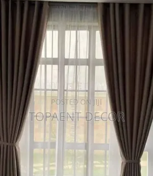 Brown Gathered Window Curtains and White Sheers