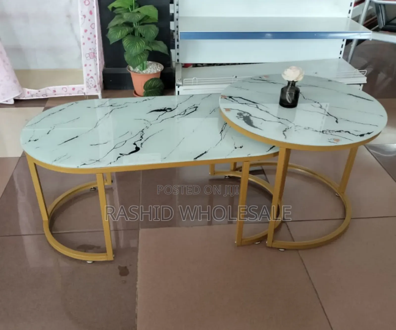 White Marble Nexting Table.