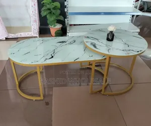 White Marble Nexting Table.