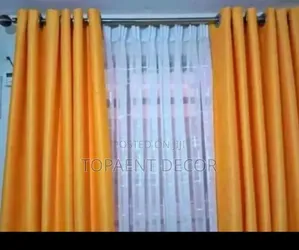 Orange Window Curtains and White Sheers