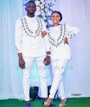 Couple Wear Shirts With Embroidery.