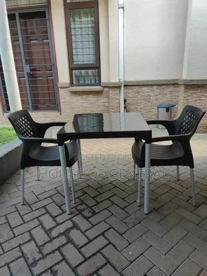 Plastic Chairs and Plastic Table With Metal Legs