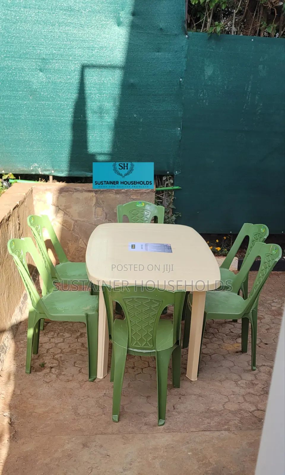 Green Plastic Chairs and a Rectangular Plastic Table( Cream)