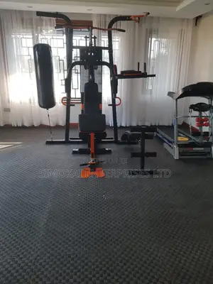 Multipurpose Gym Station With a Punching Bag