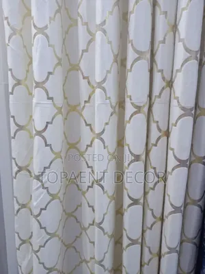 Elegant White Window Curtains and Golden Stripes